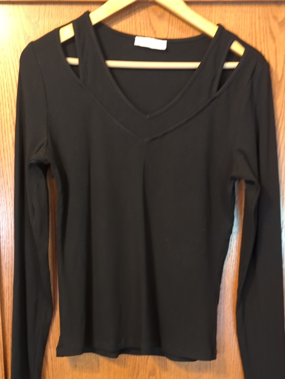 Women’s Black V-Neck Long Sleeve Top with Strap Detail